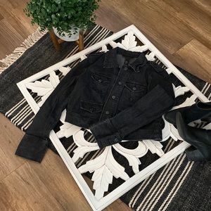 Slightly distressed black denim jacket. Size large from International Concepts.